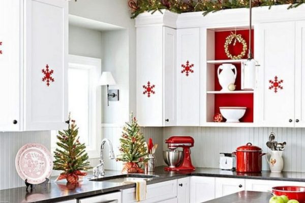 Christmas cabinets kitchen village above decorating garland display villages houses top love board ideas decorate winter country traditions halloween decorations