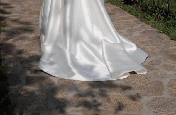 Wedding dress with flowers on the bottom